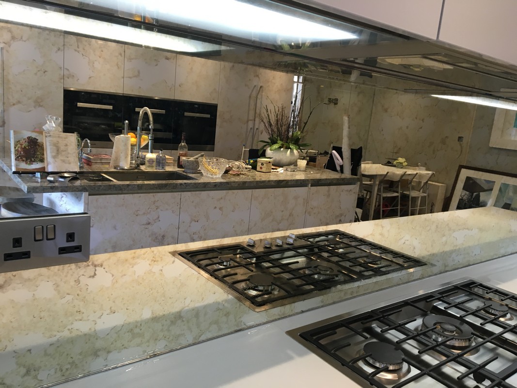 Mirror glass splashback in Upper Edmonton luxury kitchen