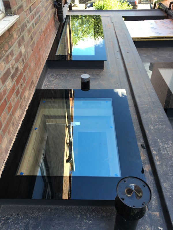 Multiple flat roof skylights on extension in Upper Edmonton